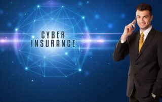 A man in a suit stands next to a digital network graphic with the words Cyber Insurance on a blue background.