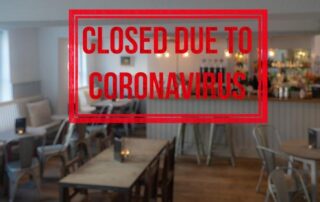 A room with tables and chairs.