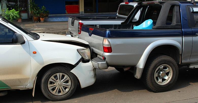 A car accident with a wrecked pickup.