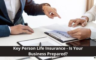 Two people in business attire review and discuss life insurance documents at a desk, with the text: Key Person Life Insurance - Is Your Business Prepared?.