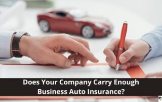 Two people review and sign a document at a desk with a toy car and calculator, with text asking about sufficient business auto insurance.