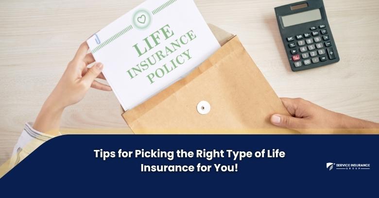 Person holding a life insurance policy document over a brown envelope on a wooden desk.